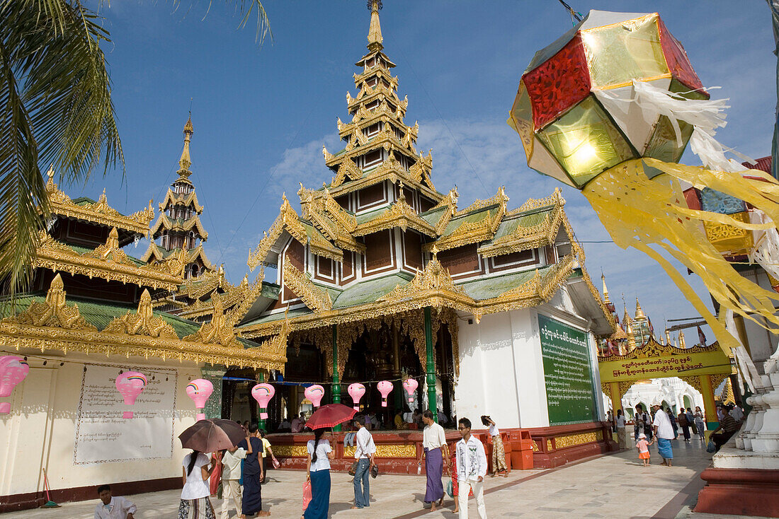 Chinese lanterns in front of a temple on the grounds of the Shwedagon Pagoda at Yangon, Rangoon, Myanmar, Burma