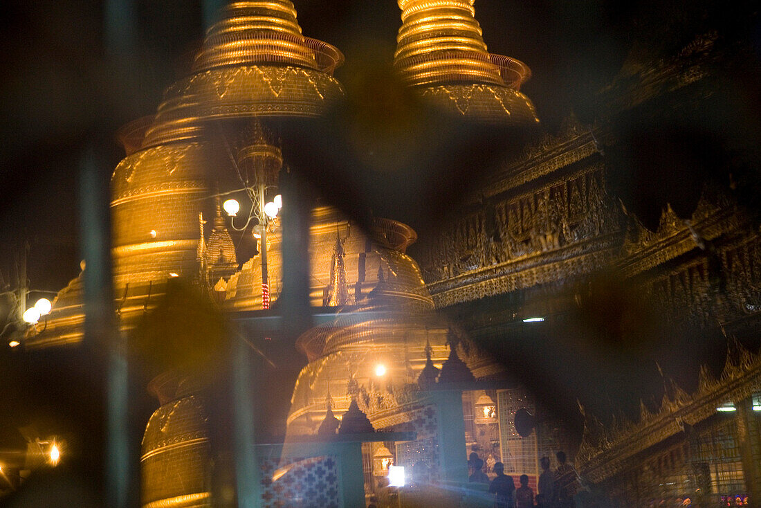 Reflections of the golden stupa of the Botataung Pagoda at night, Yangon, Rangoon, Myanmar, Burma
