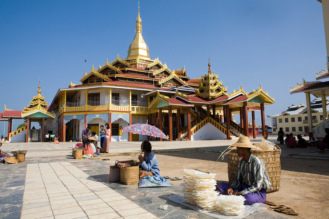 Market vendors in front of a Pagode at Inle Lake, Shan State, Myanmar, Burma