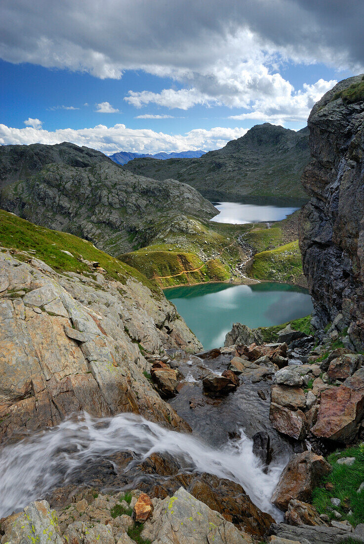 waterfall with lake Grünsee and Langsee in background, Spronser Seenplatte, Texelgruppe range, Ötztal range, South Tyrol, Italy