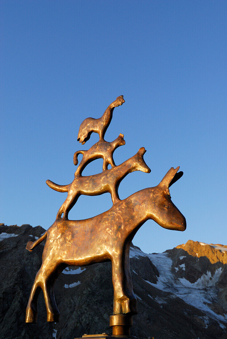 Bremer Stadtmusikanten, bronze sculpture in front of Bremer Huette showing cock, cat, dog and donkey, figures of fairy tale by Brothers Grimm, Stubaier Alpen range, Stubai, Tyrol, Austria