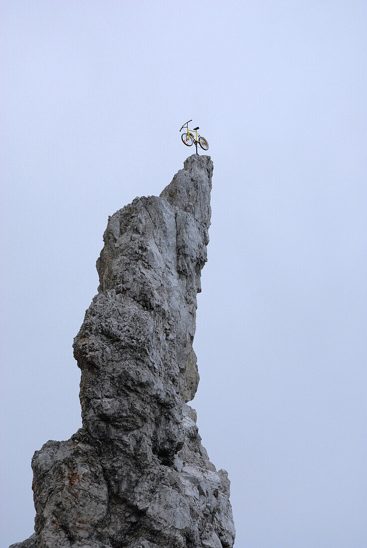 Bycicle on pinnacle, Mieming range, Tyrol, Austria