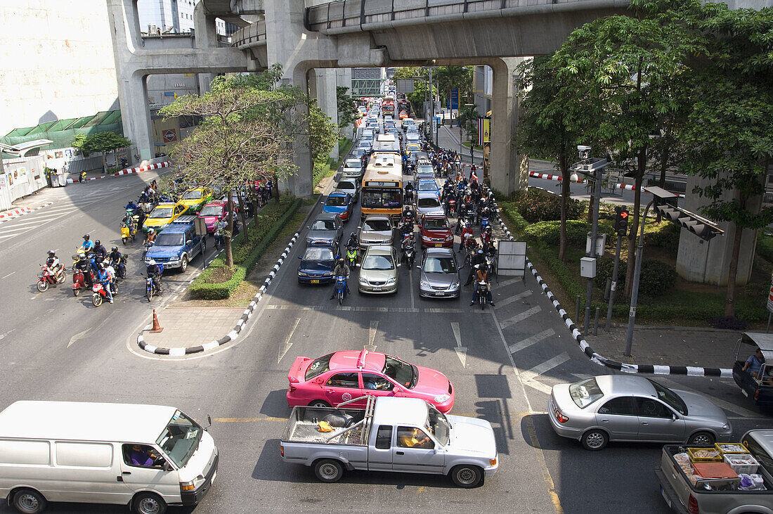 Morning Traffic on Phaya Thai Road opposite the MBK Center, Bangkok. Thailand