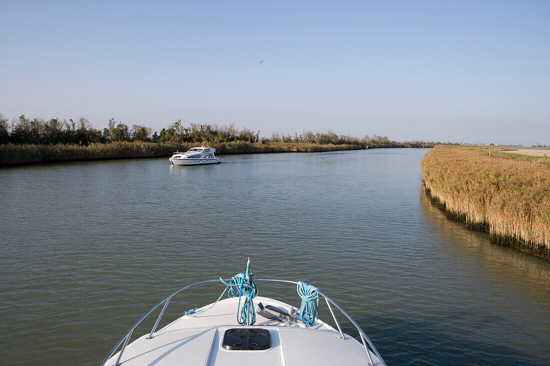 Bow of Le Boat Magnifique houseboat on the Silone Canal, Torcello, Veneto, Italy