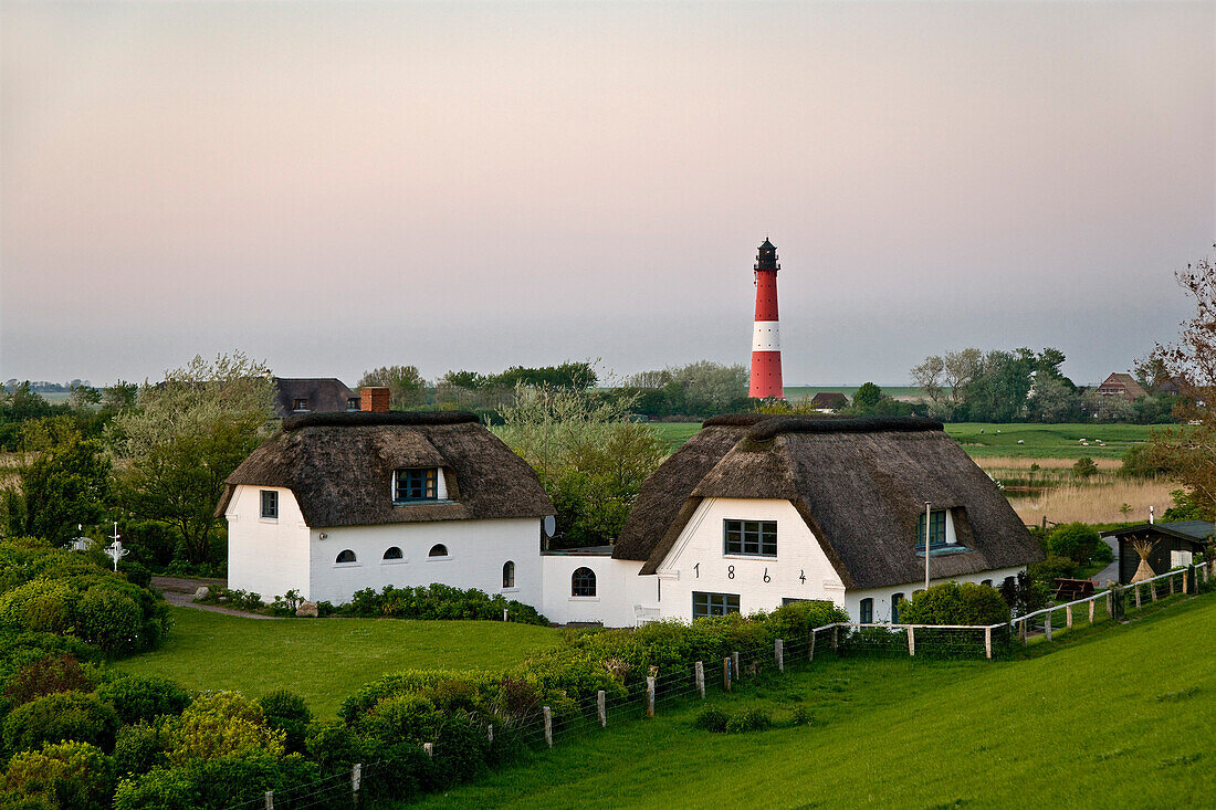 Thatched House and Lighthouse, Pellworm Island, North Frisian Islands, Schleswig-Holstein, Germany