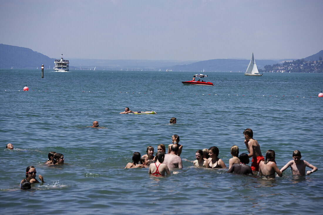 People bathing in lake Constance, Uhldingen-Muhlhofen, Baden-Wurttemberg, Germany