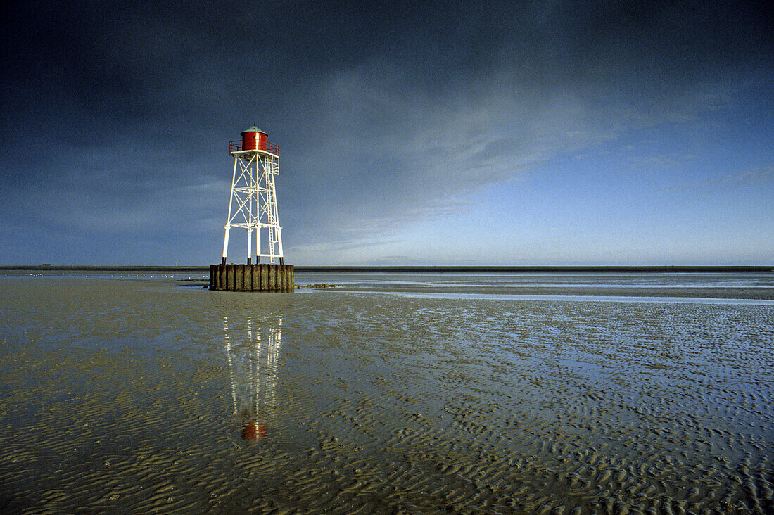 Beacon light in the tideland, Pellworm island, Schleswig-Holstein, Germany