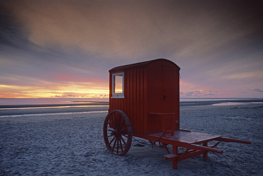 Beach wagon at the beach at dusk, Borkum island, East Friesland, North Sea, Lower Saxony, Germany