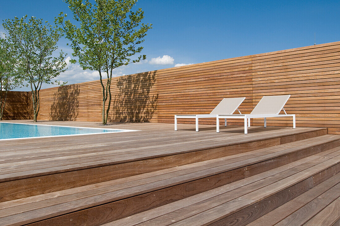 Two sunloungers at the deserted terrace next to the pool, Hotel Riva, Constance, Lake Constance, Baden-Wurttemberg, Germany