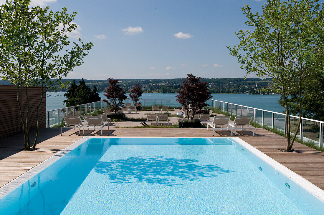 Deserted pool at the roof terrace in the sunlight, Hotel Riva, Constance, Lake Constance, Baden-Wurttemberg, Germany