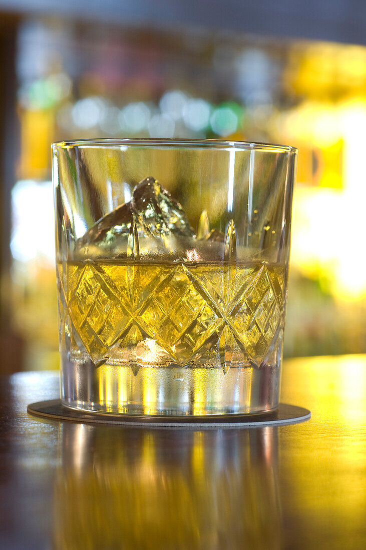 A backlit glass of whiskey, Bascule Bar, Cape Grace Hotel, Cape Town, South Africa, Africa