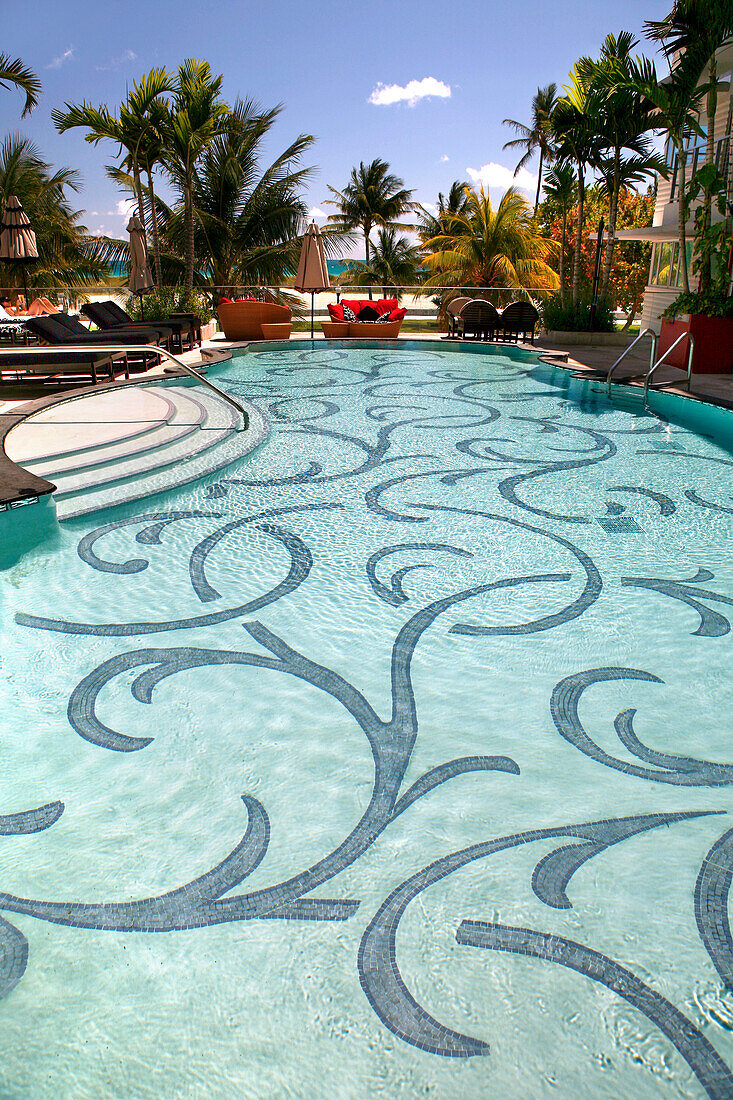 The pool of the Victor Hotel in the sunlight, Ocean Drive, South Beach, Miami Beach, Florida, USA