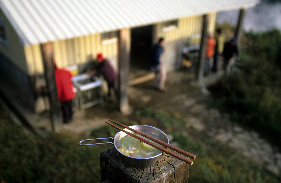 View at little cooking pot with chop sticks in front of  mountain hut 369 Shelter at Shei-Pa National Park, Taiwan, Asia