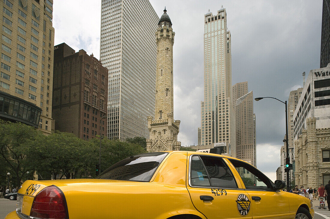 Taxi cab and Water Tower, Michigan Avenue, Chicago, Illinois, USA