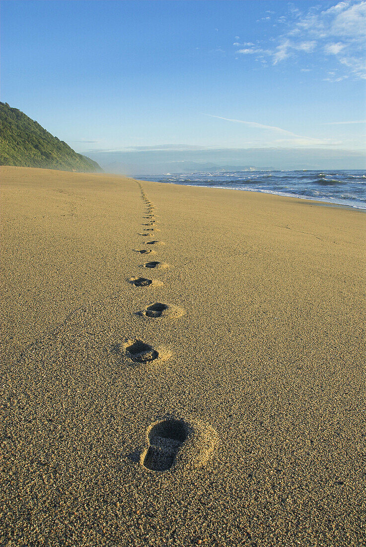 Footprints in the sand, Kohaihai Beach, Karamea, New Zealand