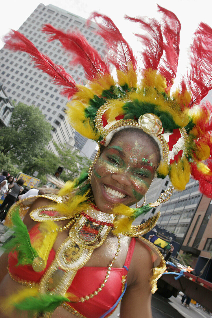 Canada, Montreal, Boulevard Rene Levesque, Mardi Gras style parade, costume, smiling Black teen girl, celebration