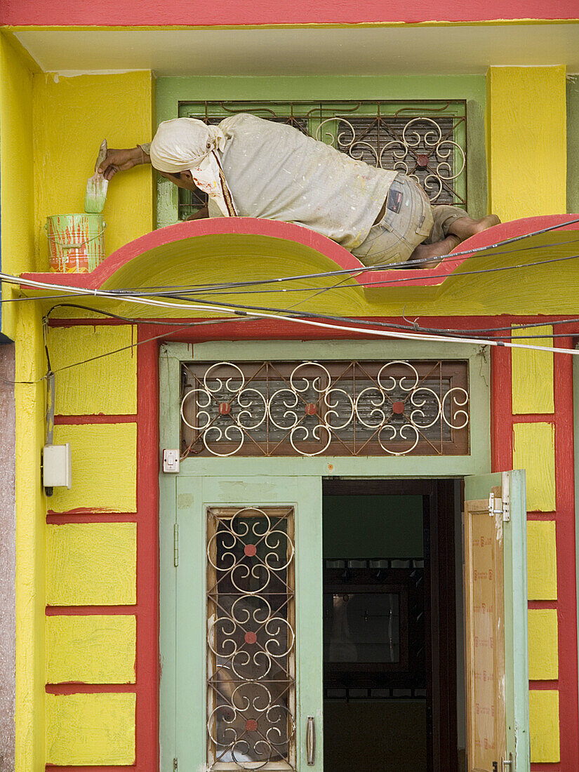 Painter at work in Bangalore, Karnataka, India