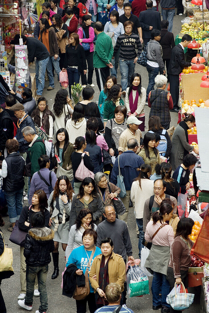 Crowds at an outdoor market in Kowloon, Hong Kong, China