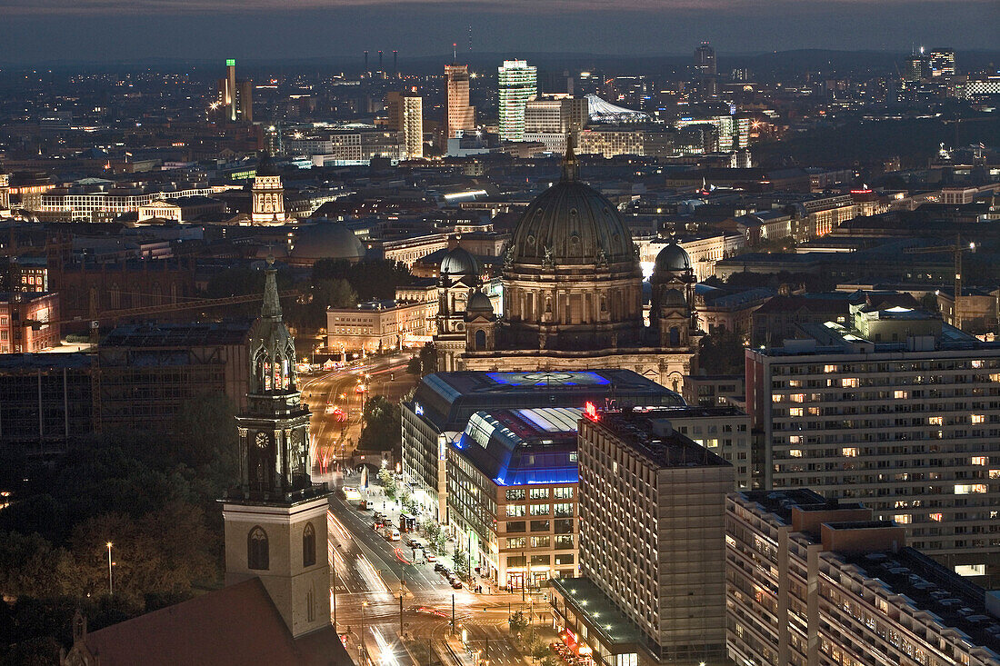 The Berlin Cathedral and the illuminated houses of Berlin at night, Potsdamer Platz, Berlin, Germany, Europe
