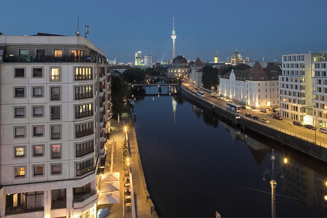 View over river Spress in the evening, television tower in background, Berlin, Germany