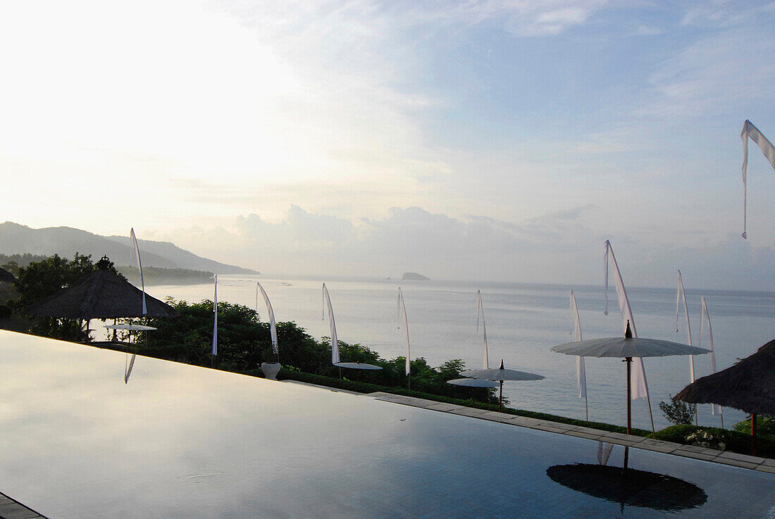 The infinity pool at the Amankila Resort in the morning, Candi Dasa, Eastern Bali, Indonesia, Asia