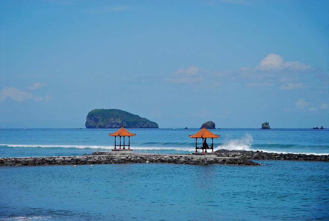 Little pavilions at the coast at Candi Dasa, East Bali, Indonesia, Asia