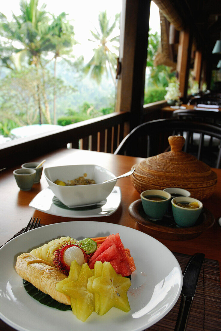 A table is laid at the window, breakfast at Amandari Resort, Yeh Agung, Bali, Indonesia, Asia