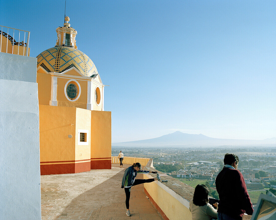 People in front of Nostra Senora de Gouadeloupe church under blue sky, Cholula, Puebla province, Mexico, America
