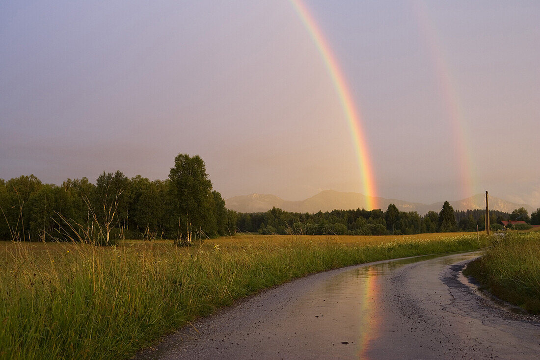 Rainbow in Alpine foothills, Upper Bavaria, Germany