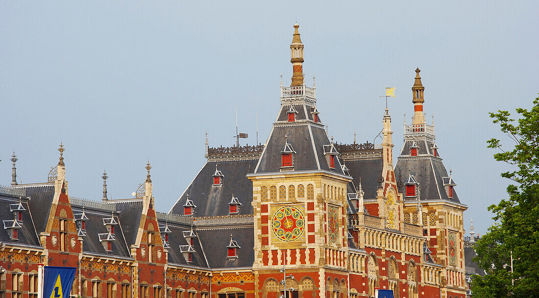View at the Central station under blue sky, Amsterdam, Netherlands, Europe