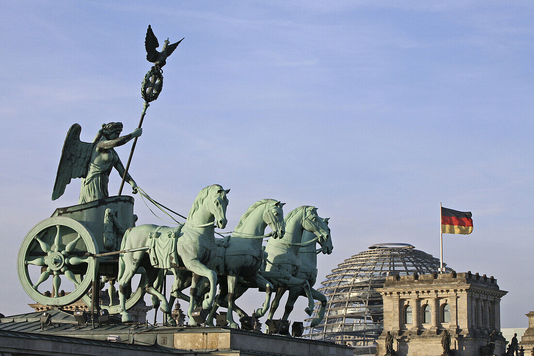 Quadriga on Brandenburg Gate, Berlin, Germany, Reichstag dome in background, Berlin, Germany