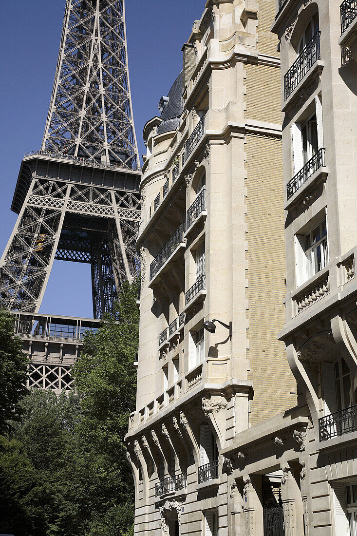 Apartment building with Eiffel Tower in the background. Paris. France