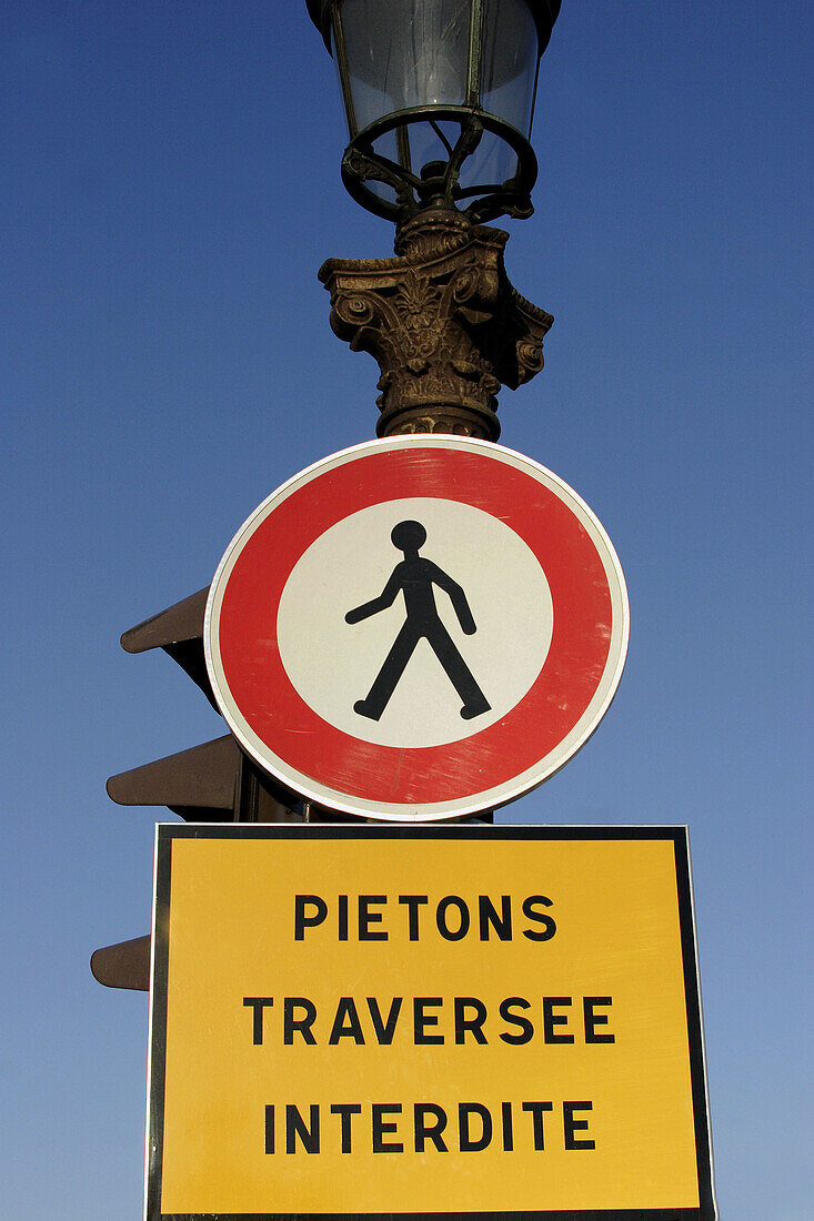 Traffic signs on a lump post in Place de la Concorde. Paris. France