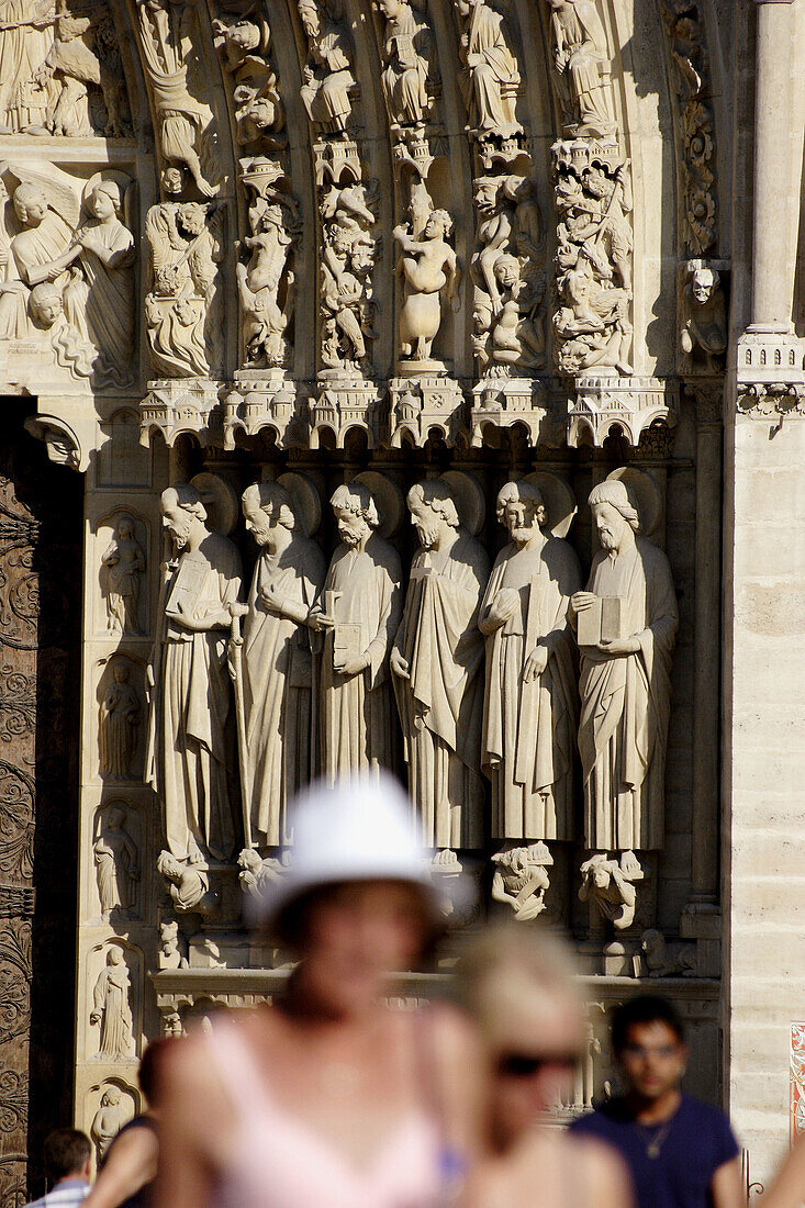 The saints statues decorated main entrance of Notre-Dame Cathedral. Paris. France
