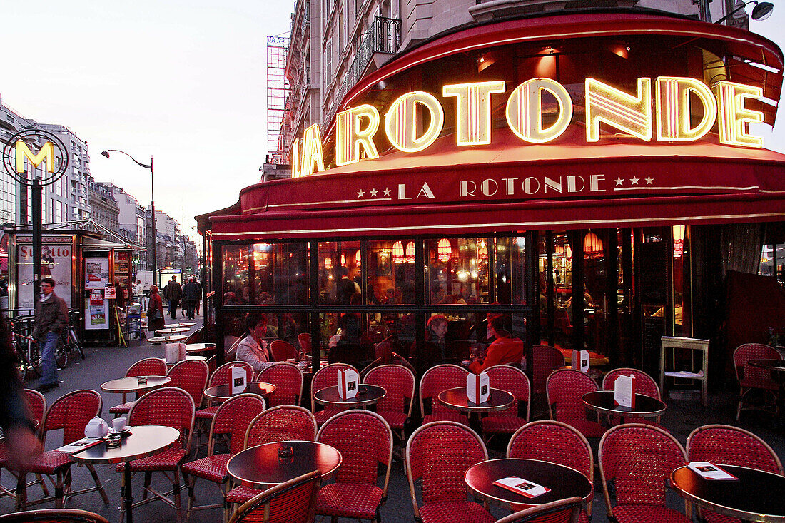 The night view of La Rotonde cafe in Montparnasse. Paris. France.