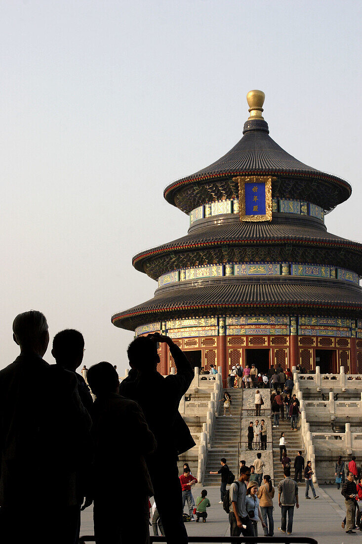 Visitors taking photos of Qinian Hall (Hall of Prayer for good harvest) of Temple of Heaven. Beijing. China
