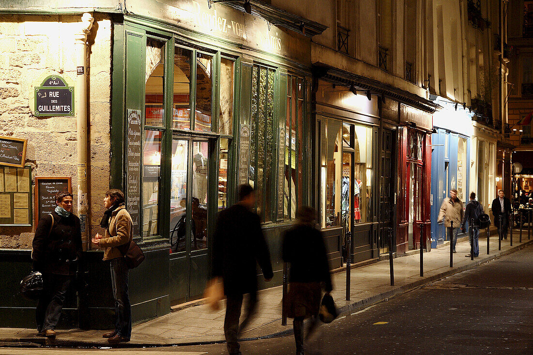 The street scene of Marais district during night. Paris. France