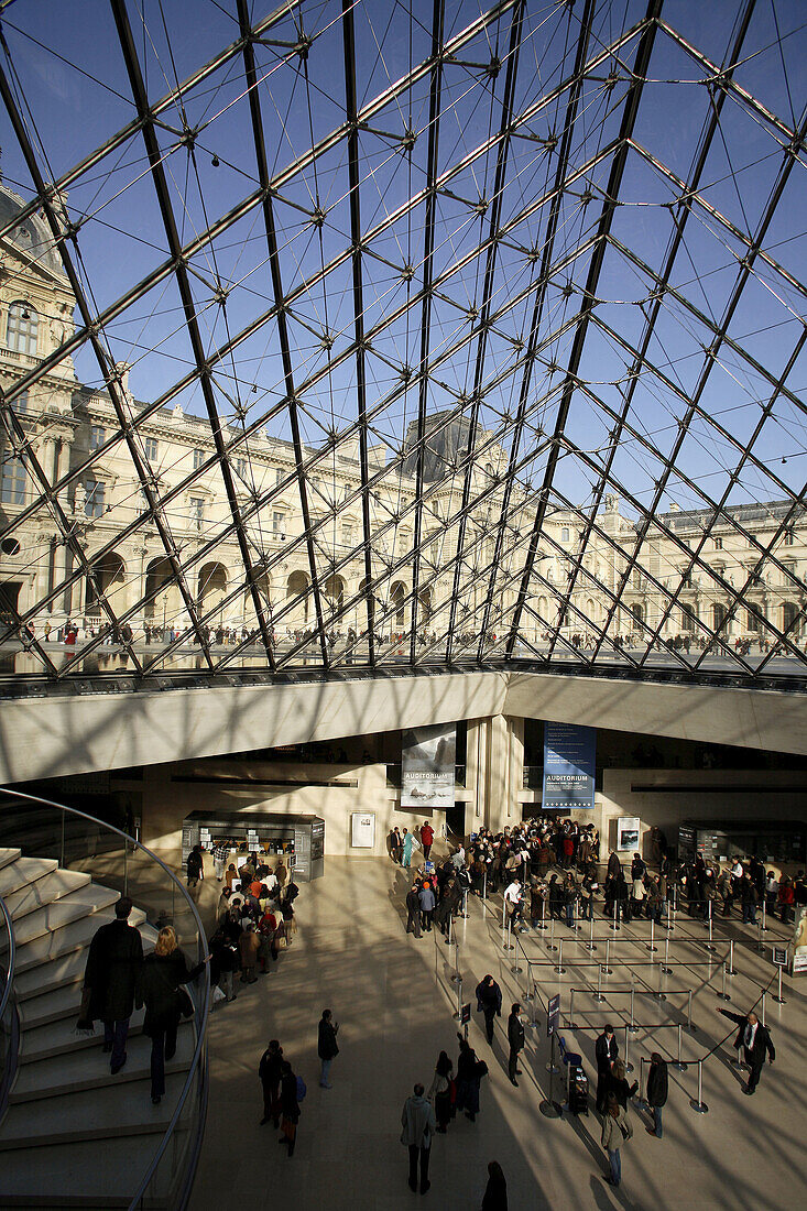 The interior view of Pyramid Entrance of Musee du Louvre. Paris. France