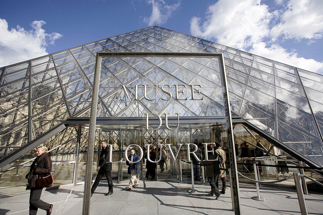 Pyramid Entrance in Cour Napoleon of Musee du Louvre. Paris. France