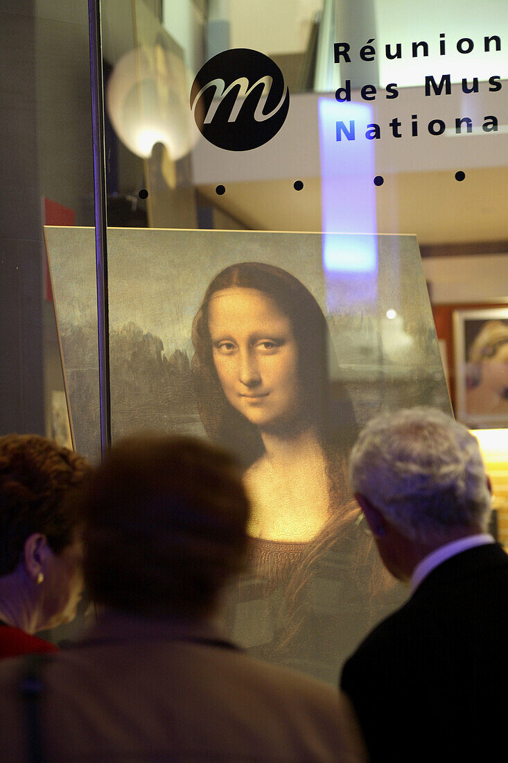 The replica painting of Mona Lisa display in the window of gift shop of Musee du Louvre. Paris. France