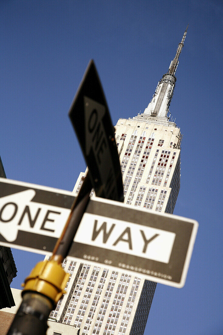 Empire State Building with traffic sign in foreground. New York City. USA