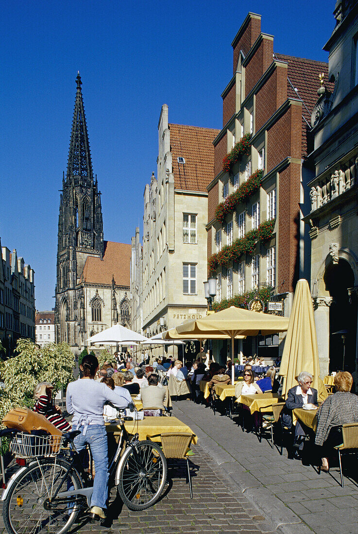 Cafes at Prinzipal market, St. Lambertus church, Muenster, North Rhine-Westphalia, Germany