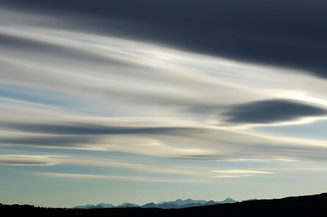 Clouds over mountains in the evening, South Tyrol, Italy, Europe