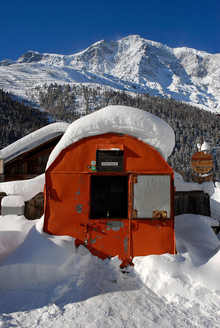 Snow covered bivouac in front of the guesthouse Yak & Yeti, Sulden, Val Venosta, South Tyrol, Italy, Europe