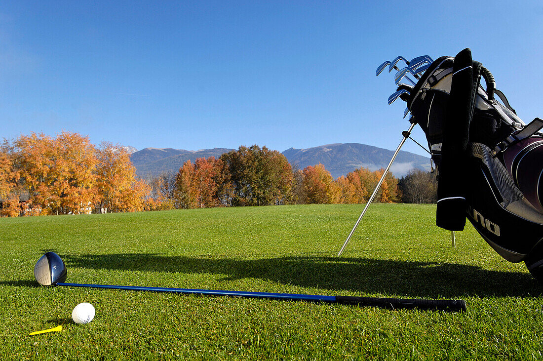 Golf bag with golf club and golf ball, Reischach golf club, Puster valley, Val Pusteria, South Tyrol, Italy