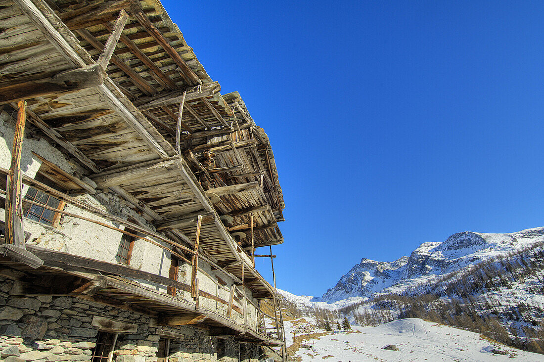 Façade of a traditional walser bulding known as 'rascard' in the village of Resy. Ayas municipality, Val d'Aosta, Italy