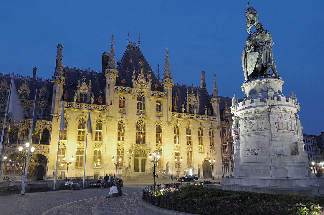 Provincial Government palace and monument to Jan Breydel and Pieter de Coninck in the Markt (Market Square) at dusk. Brugge. Flanders, Belgium