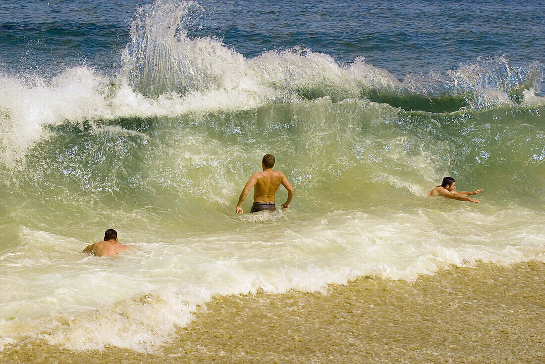 Boys playing in the surf at Nauset Beach, Cape Cod National Seashore, Cape Cod, Orleans, Massachusetts, USA