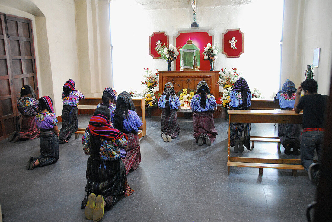 Women praying, Santiago Atitlan. Guatemala