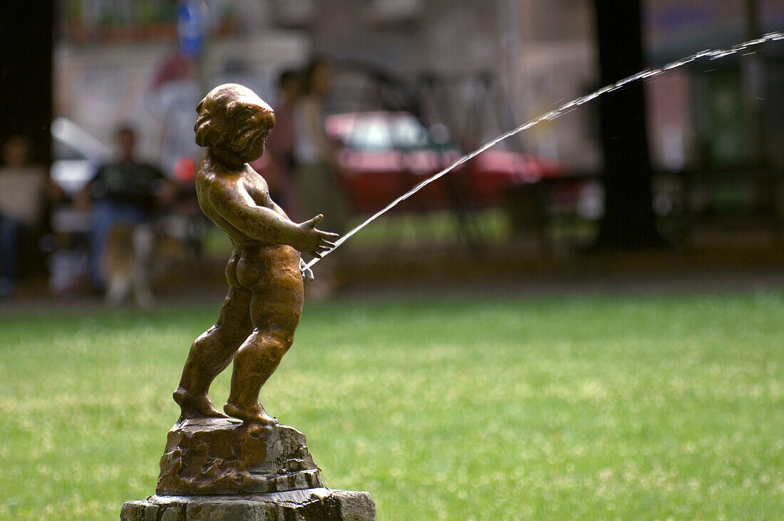 Statue in a small park of a young boy urinating, Zagreb, Croatia